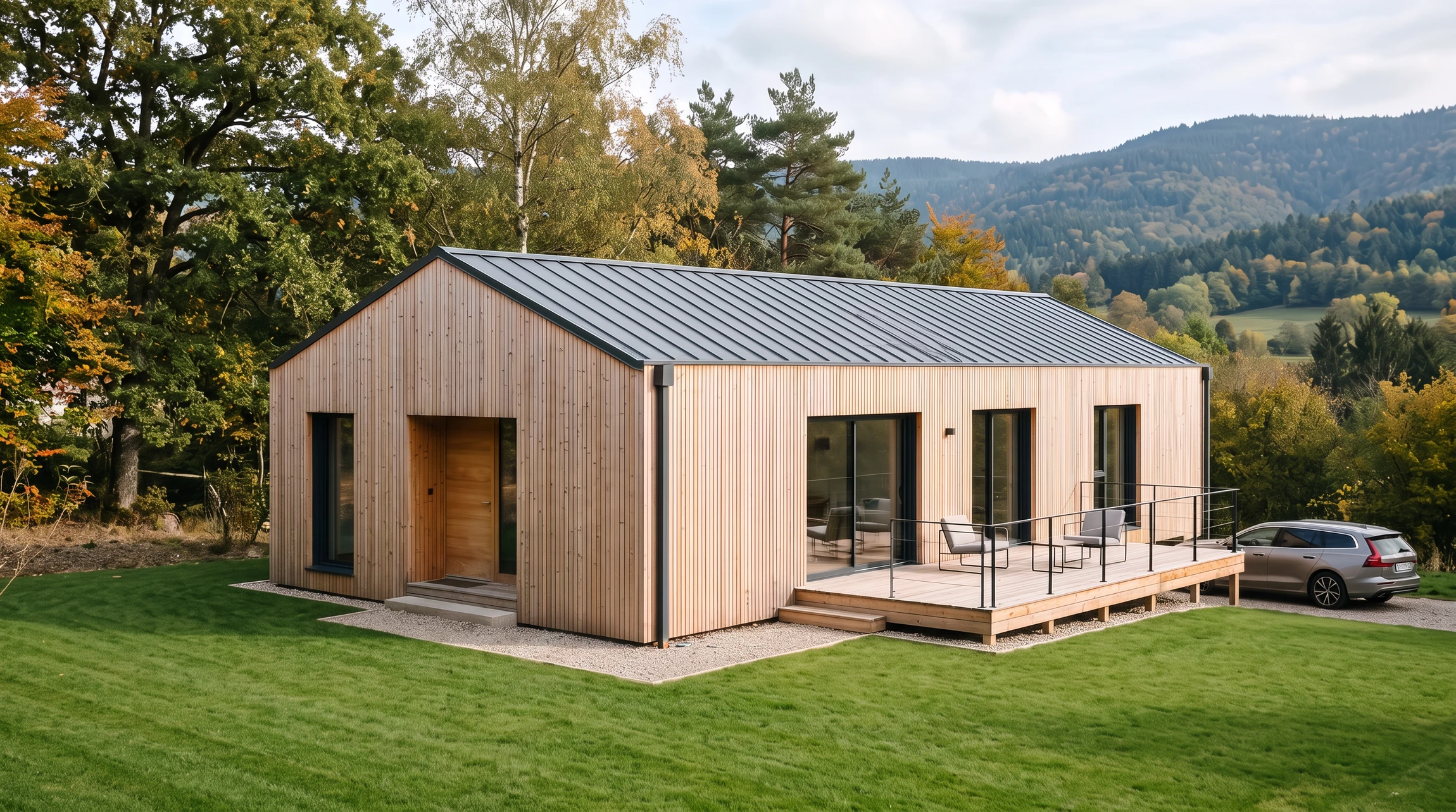 Maison contemporaine à ossature bois avec bardage en bois naturel et toiture ardoise